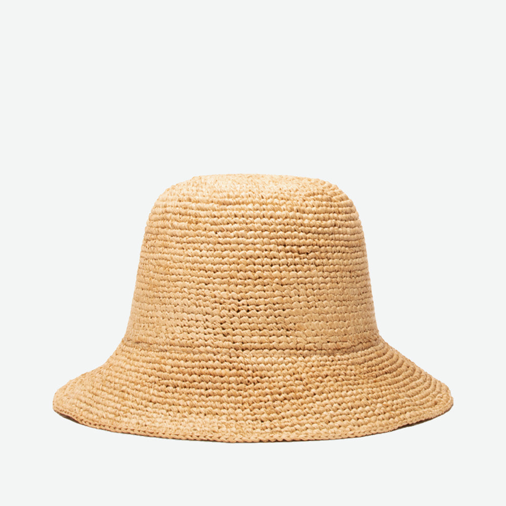 Beige woven bucket hat on a light gray background