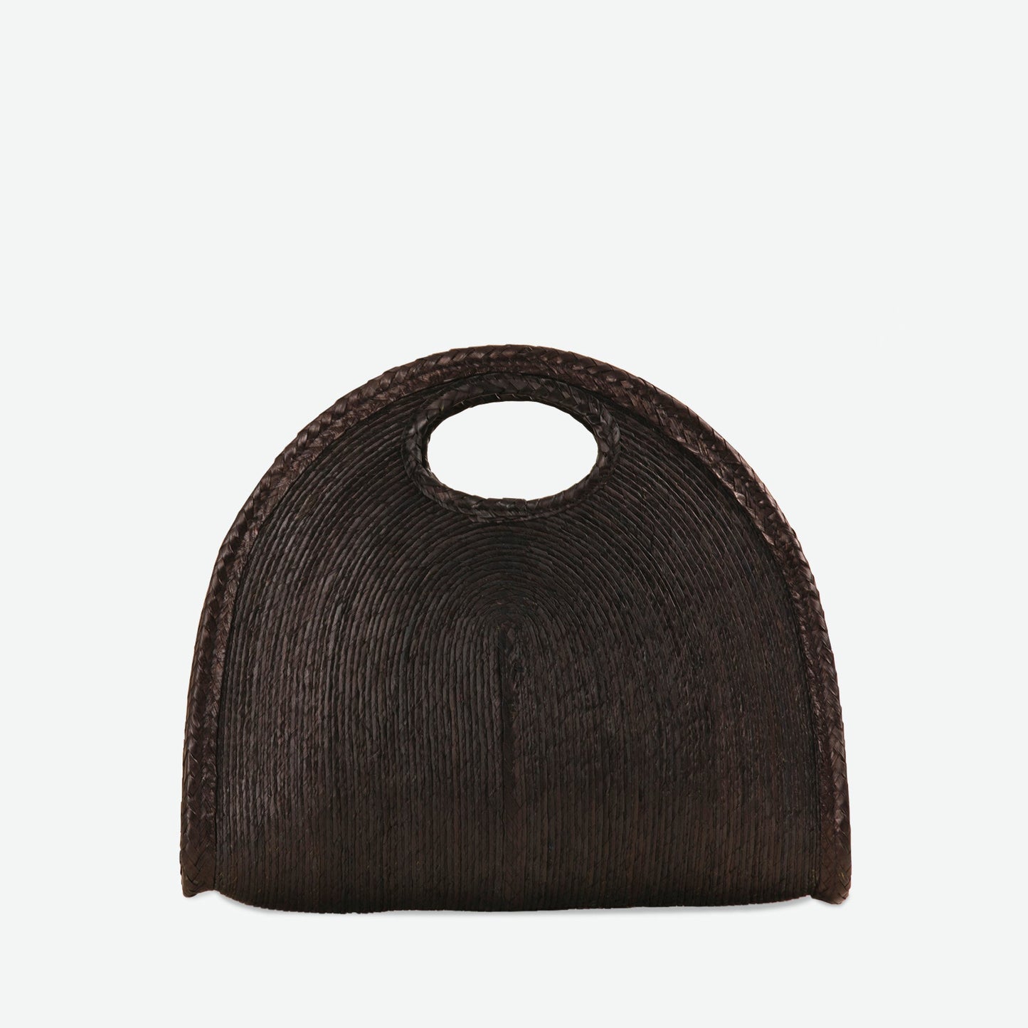 Black woven straw handbag on a light gray background